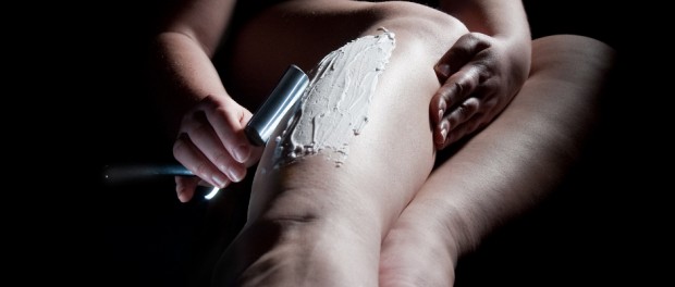 shaving legs woman shaving legs