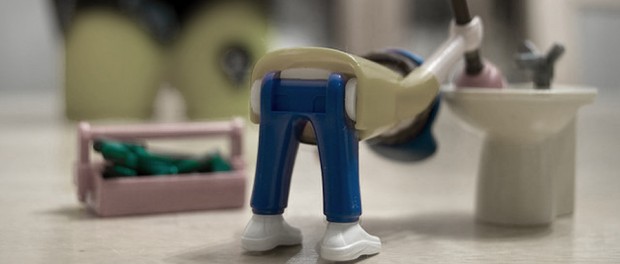 Plumber Butt a toy plumber bending over