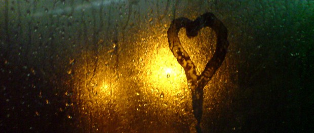 To the Window heart shape on wet window