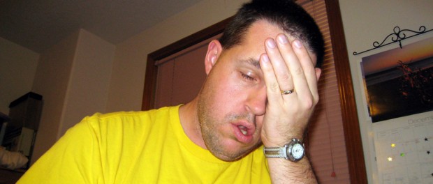 A Cure for Headaches man with a headache