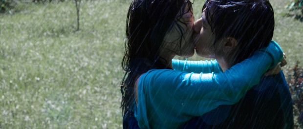 Rain Love couple kissing in the rain